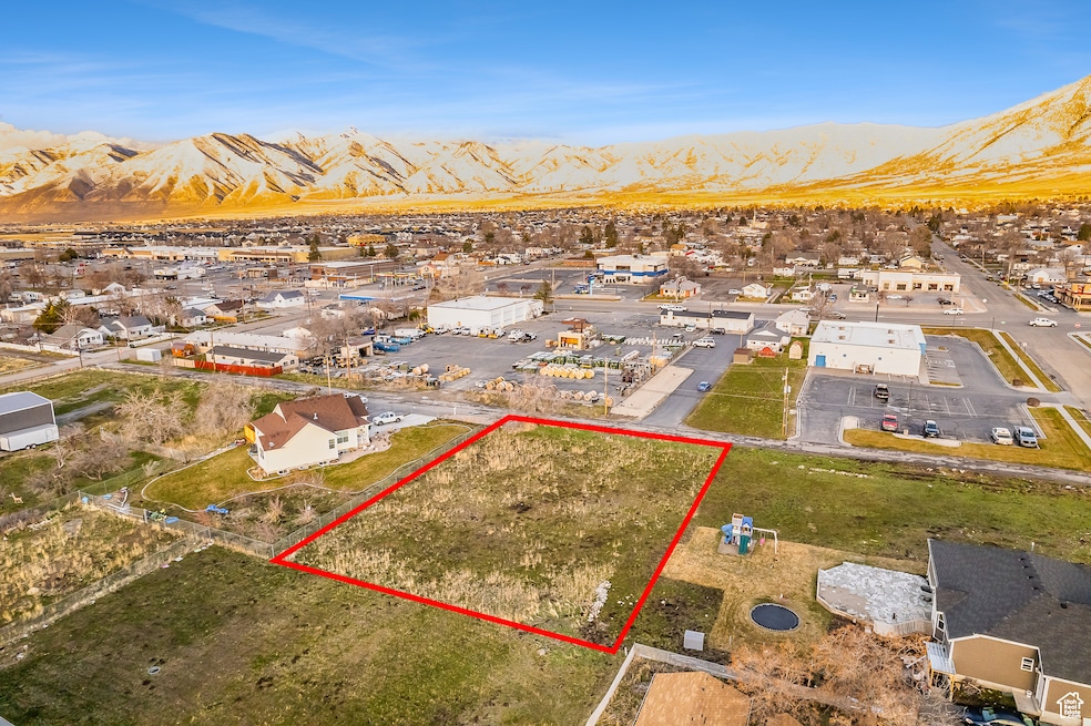 Drone / aerial view with a residential view and a mountain view