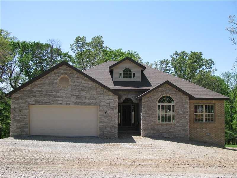 Exterior Front. Stone & Brick exterior