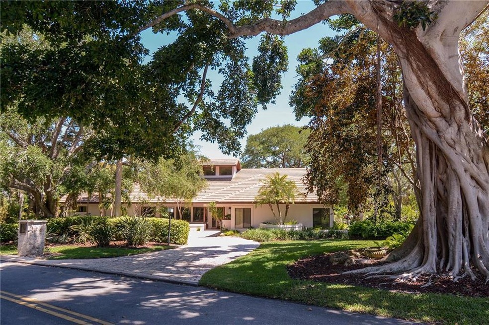 Nestled among mature Oak Trees with wide circular