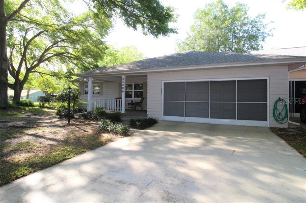 Front of home with screened garage door and plenty