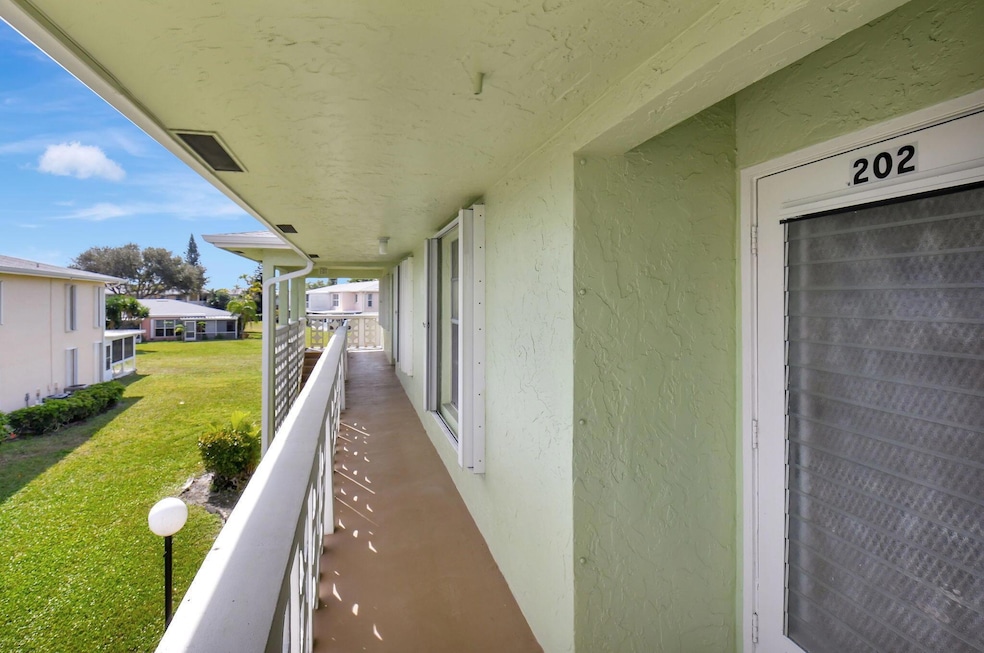 1670 NW 18th Ave unit 202, Delray Beach, FL 33445 - photo 1