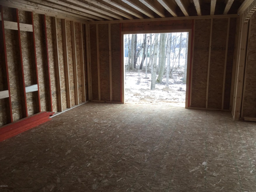 7865 Carliele Crossings Blvd SW, Byron Center, MI 49315 - photo 1