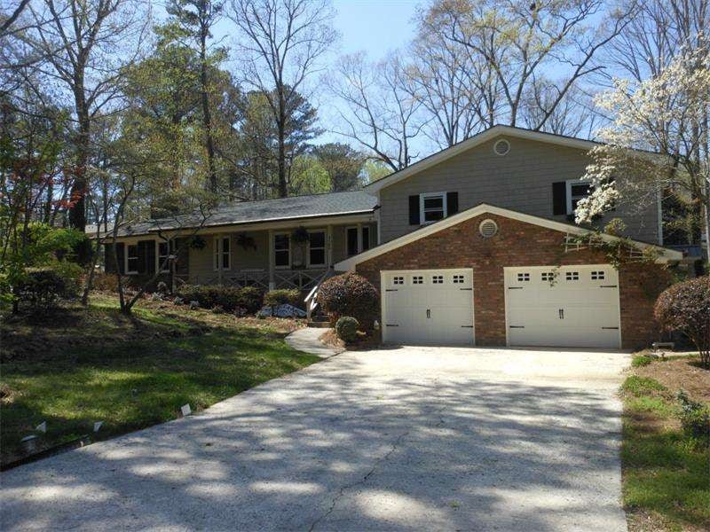 CUSTOM BUILT SPLIT LEVEL, 2 KITCHENS,3 DINING AREAS, 2 FAMILY ROOMS, SPACIOUS OPEN FLOOR PLAN.