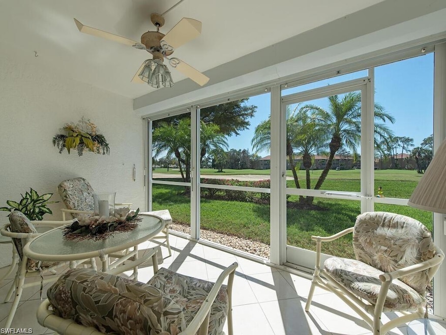 Sunroom / solarium featuring plenty of natural light and a ceiling fan