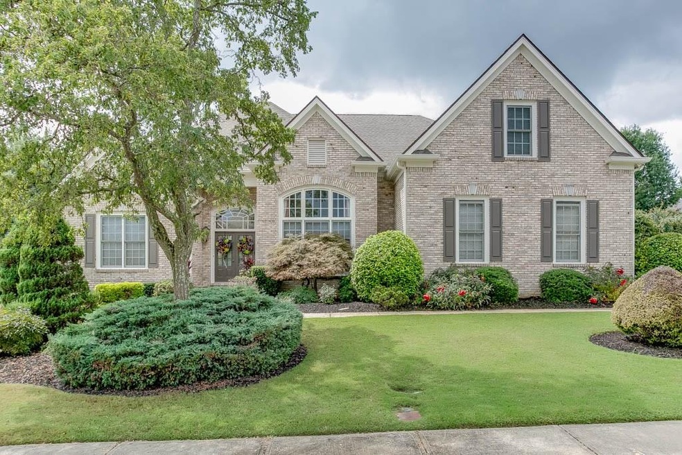 Gorgeous brick front home with side entry garage l