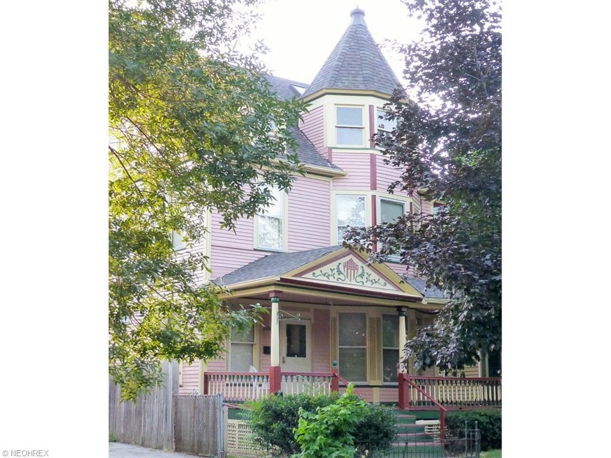 This rose-colored Victorian graces West 52nd Stree