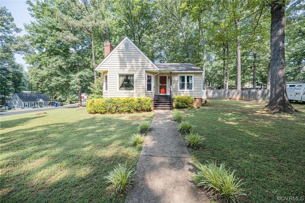 View of front of house with a front lawn