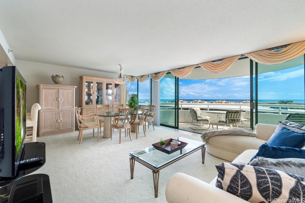 Huge living room has great  ocean view