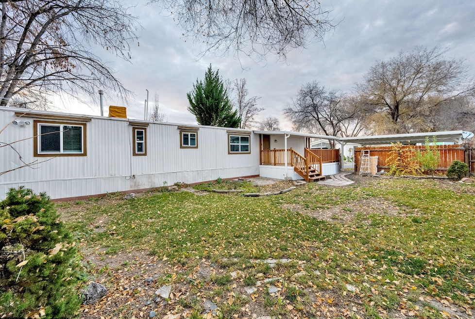 Back of property with a chimney