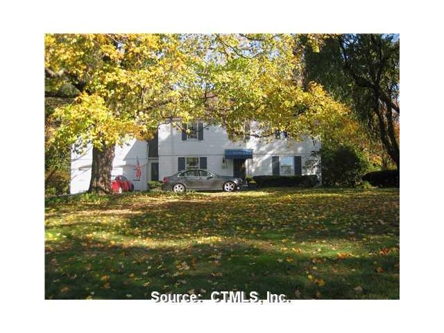 Exterior Front. Gracious Colonial beautifully set 