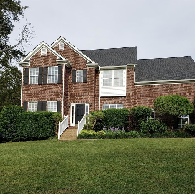 This home won't disappoint! Open floor plan with wood floors on main level