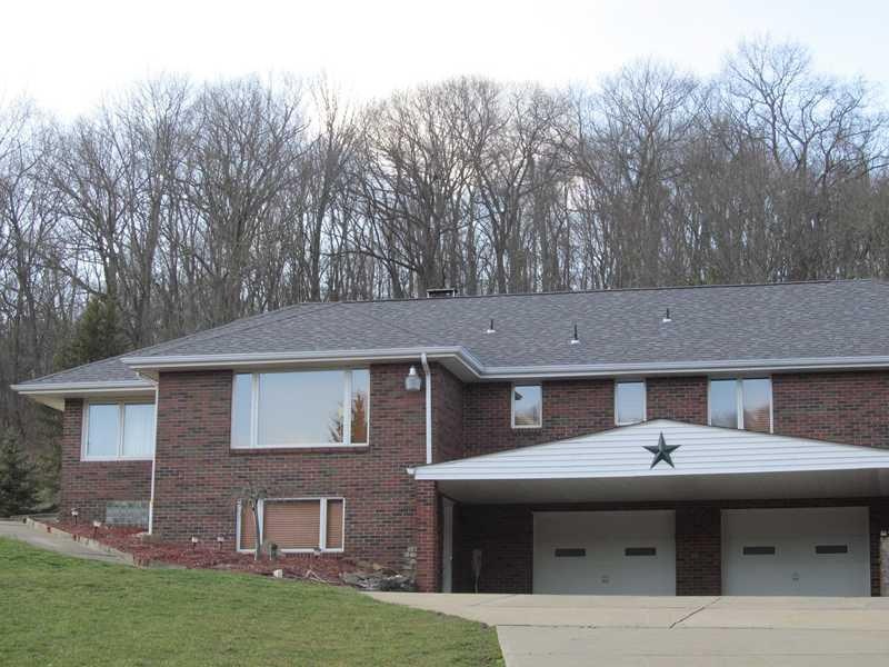 Exterior Front. All Brick raised ranch on 2.8 acre