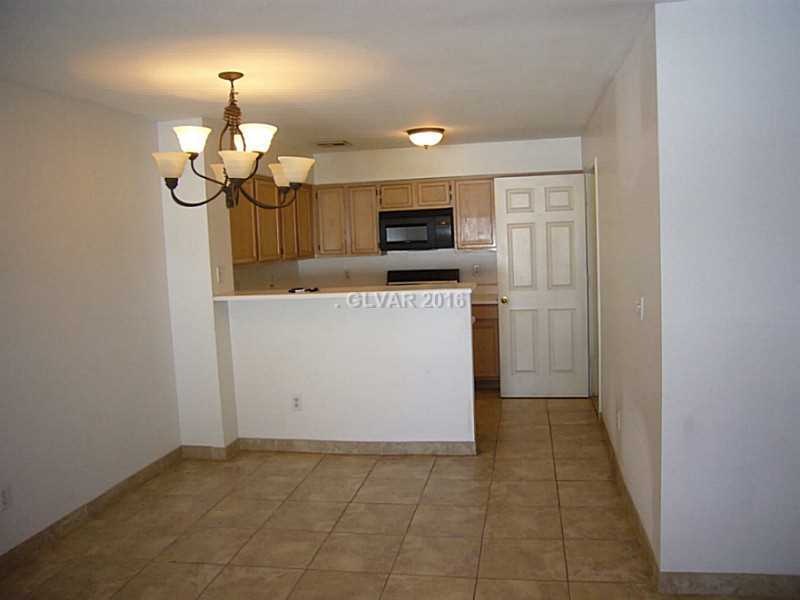 Living Room. Entrance/Living room towards the kitc