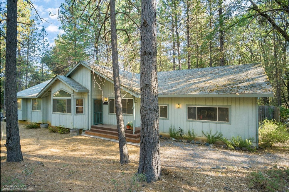 Main House 1905 SF 3/2 plus office. Single story