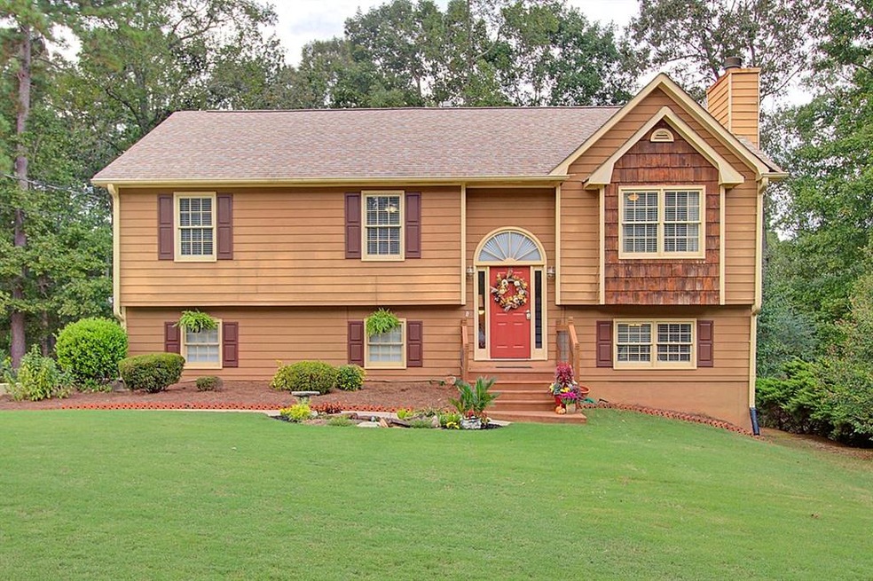Newly updated home with a beautifully landscaped y
