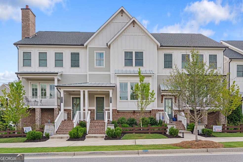 Spacious townhome with front porch in the heart of