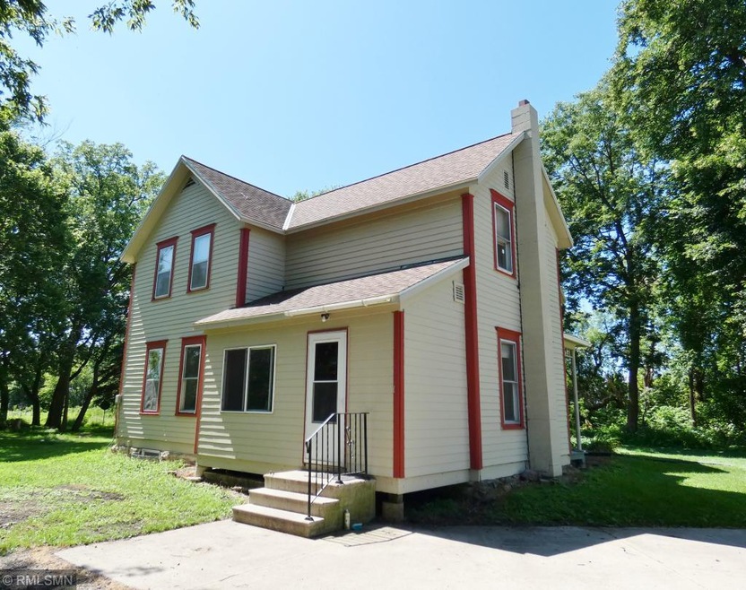 Spacious farmhouse style two-story home features 5