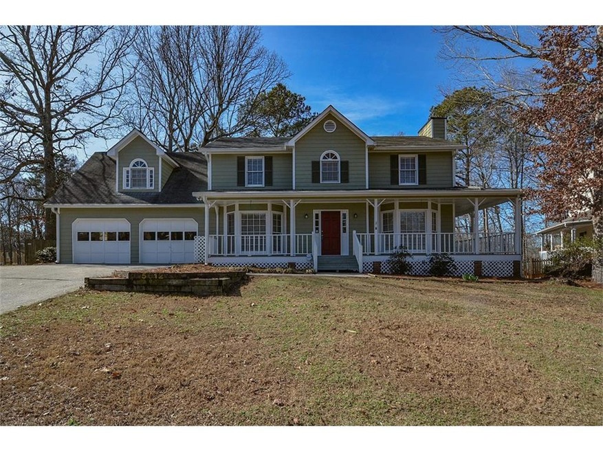 Beautiful home with wrap around porch!  Located cl