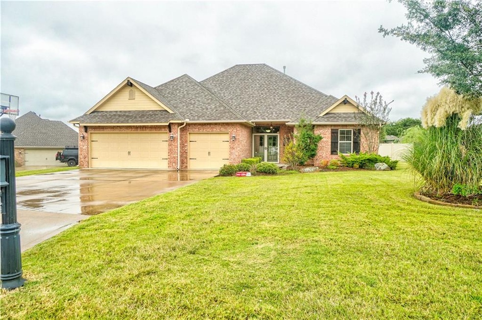 3 car garage with lots of drive-way space and a st