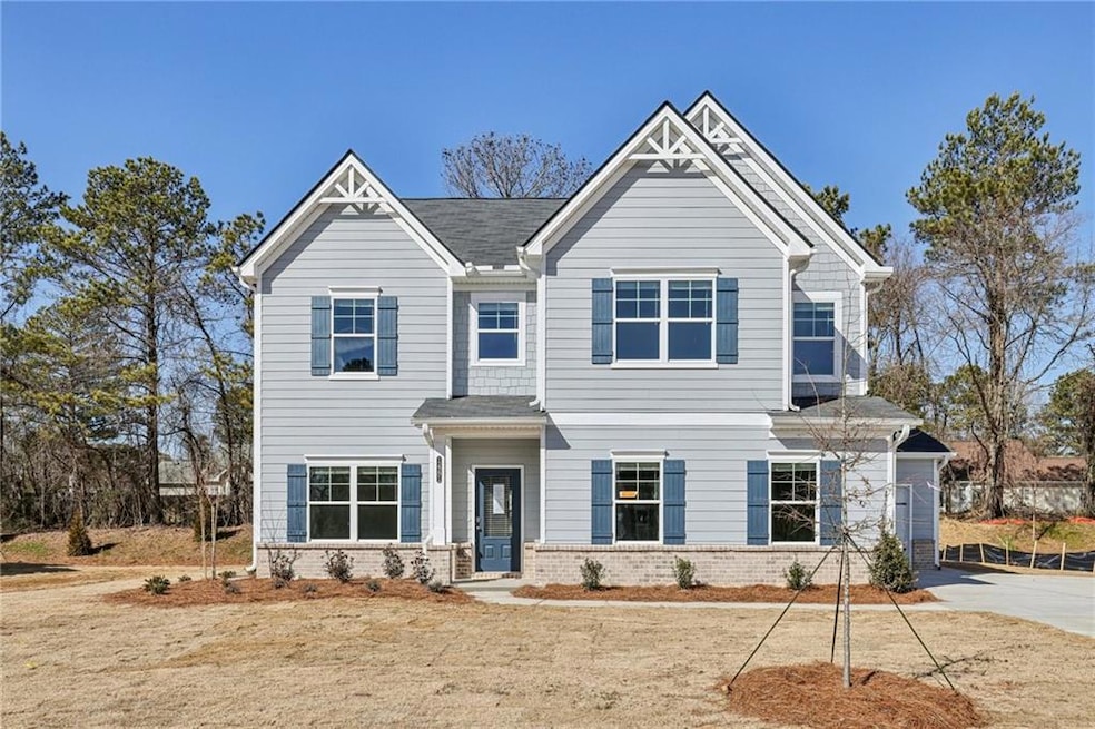 View of front of property with brick siding