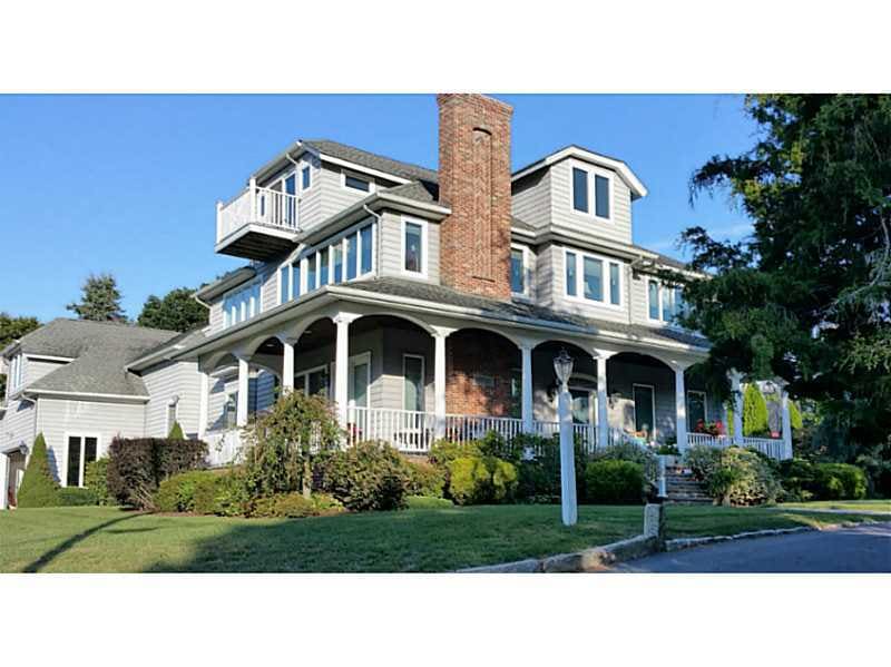 Exterior Front. SUPERA SIDING,BRICK CHIMNEY,BRICK