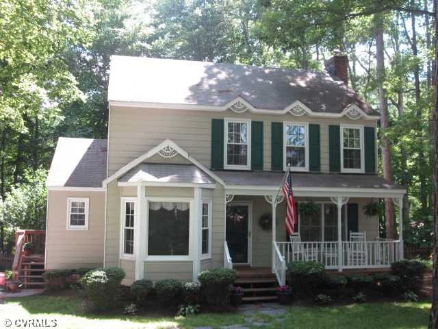 Exterior Front - This house is nestled on a park-l