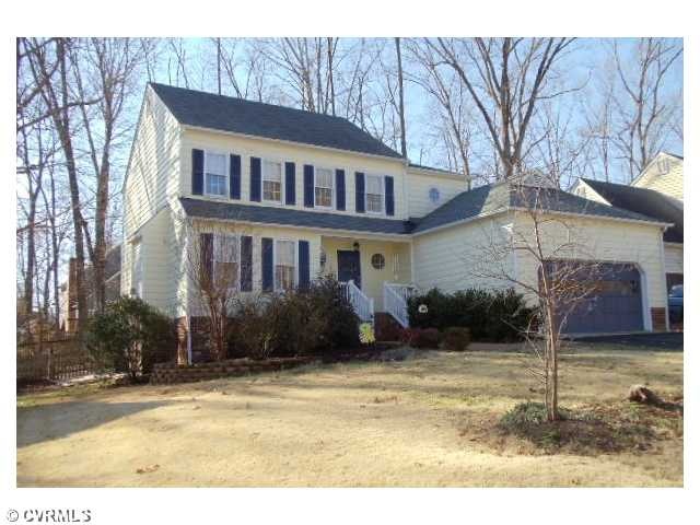 Exterior Front - Spacious lot setting in Woodlake.