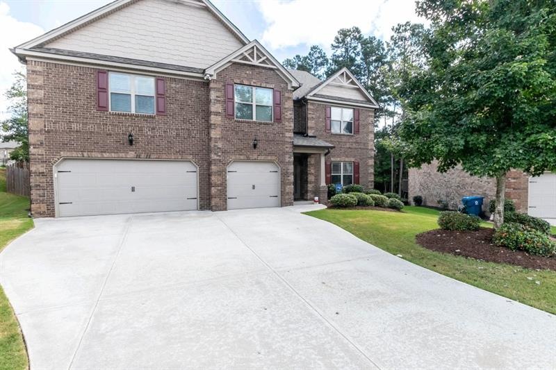 4 sided Brick- 3 story Home with a 3 car garage