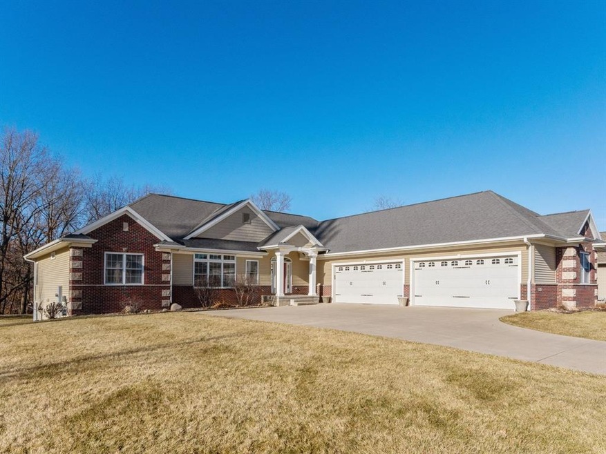 Welcoming front porch and 4 stall garage