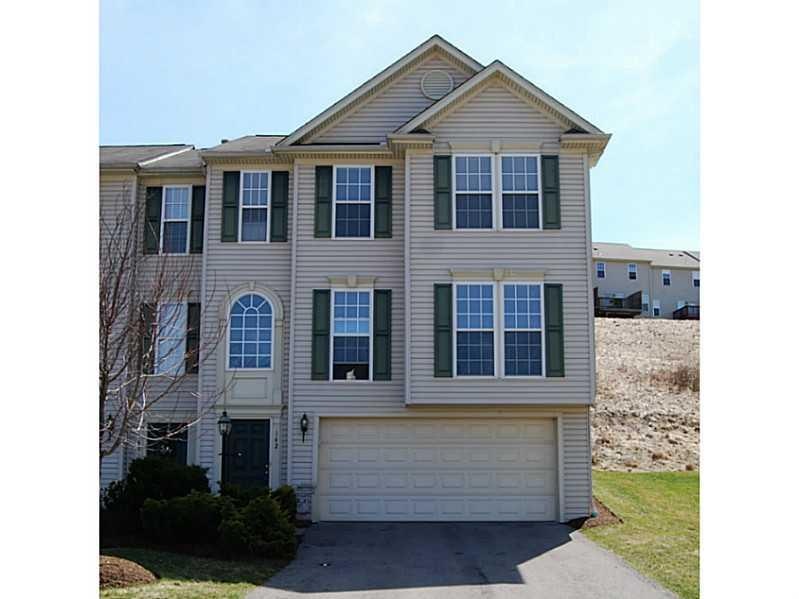 Exterior Front. Beautiful End Unit is Ready to Mov
