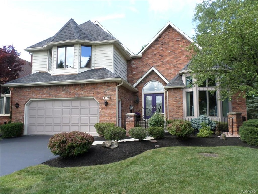 Exterior Front -beautifully landscaped