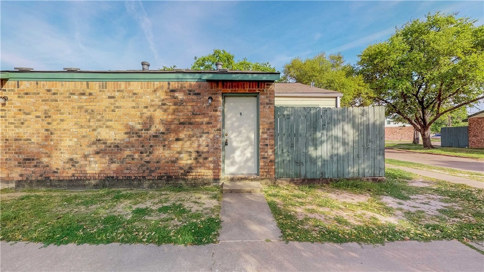 View of outdoor structure with fence