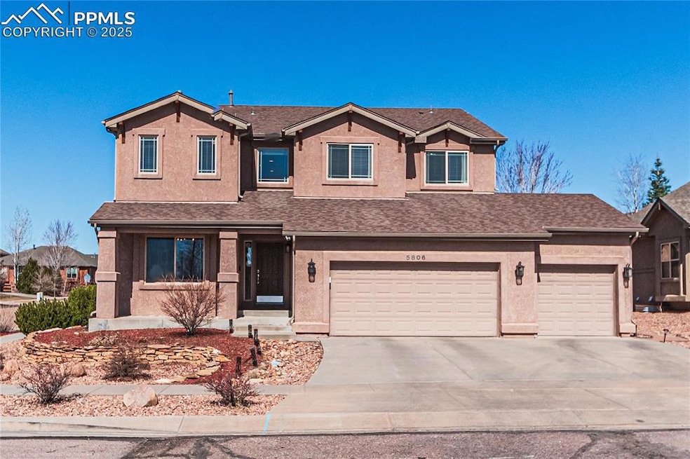 View of front of house featuring stucco siding, co