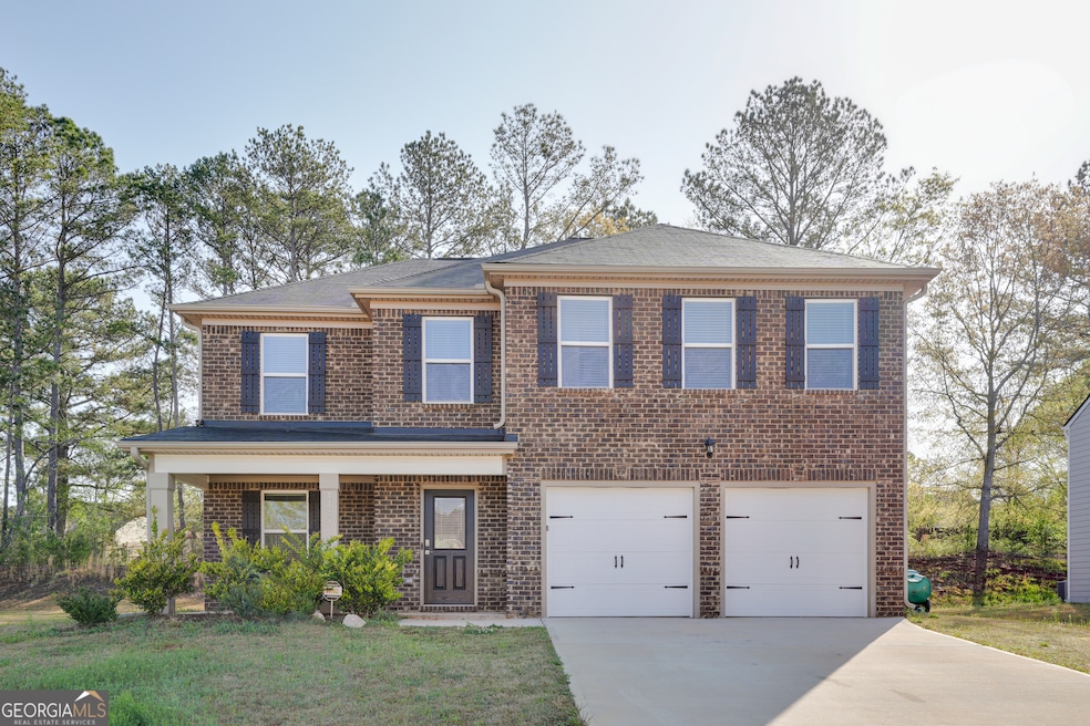 1144 Bluecoat Cir, Hampton, GA 30228 - photo 1