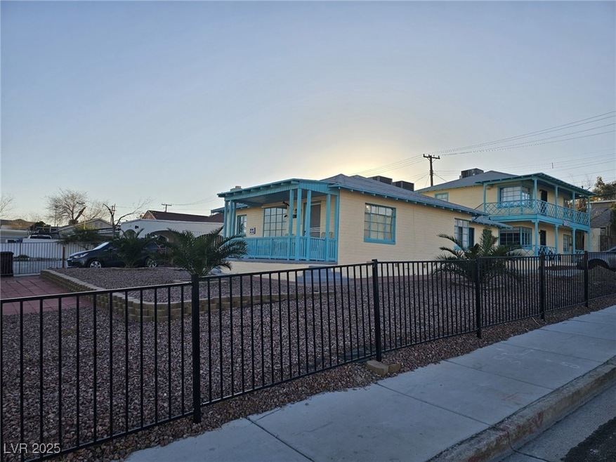 View of front of home featuring fence private yard