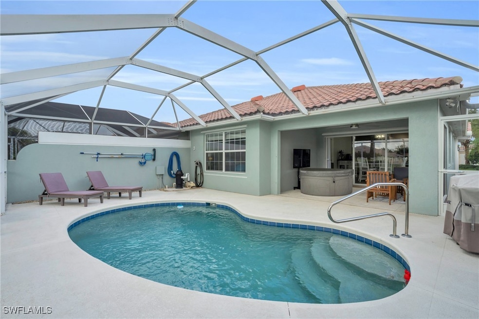 Outdoor pool featuring a patio and a lanai