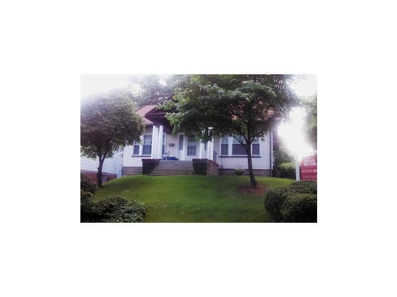 Exterior Front. Cozy and inviting front porch.  We