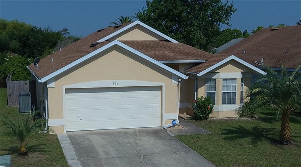 Florida Contemporary has mature landscaping.
