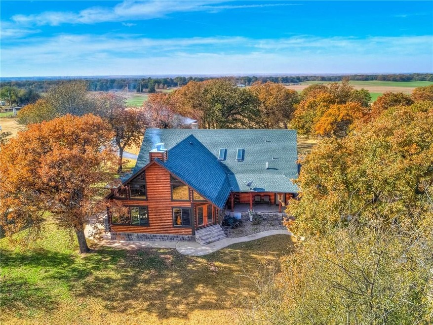 Beautiful custom log cabin home with 2 wood burnin