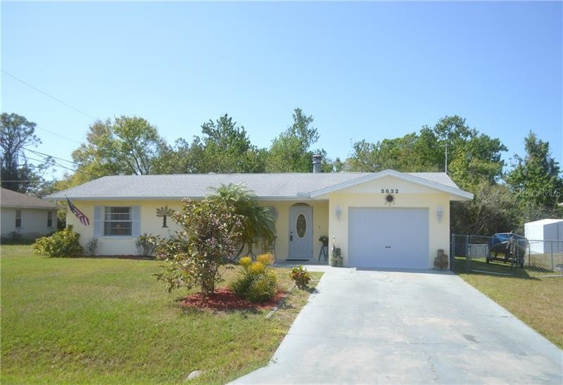 Front of the house and long driveway
