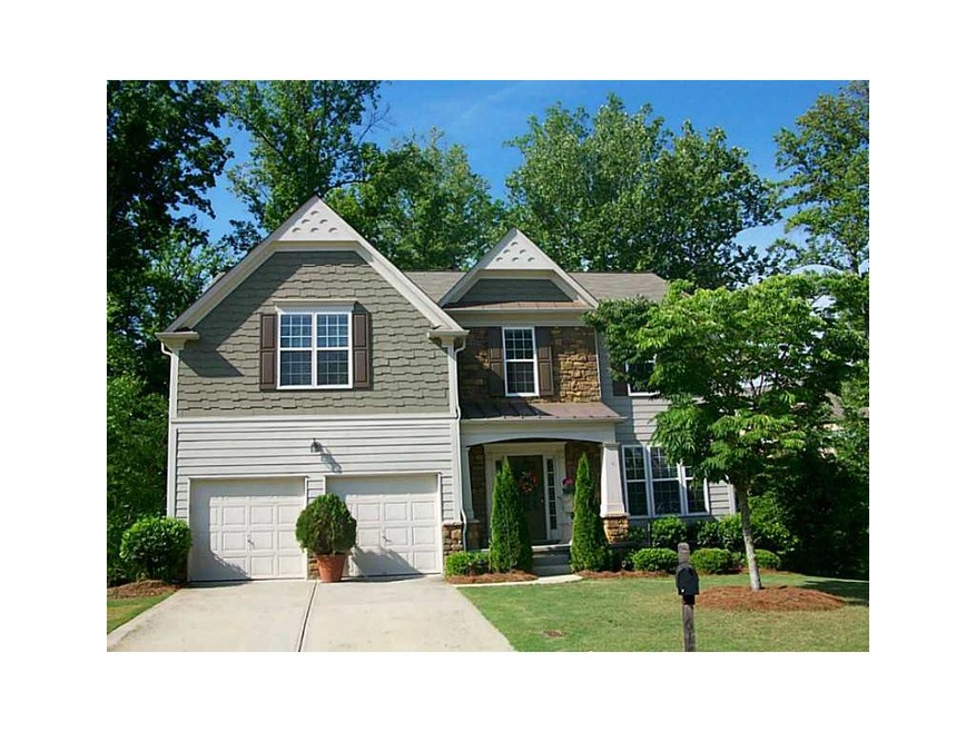 Exterior Front. cement siding, stacked stone