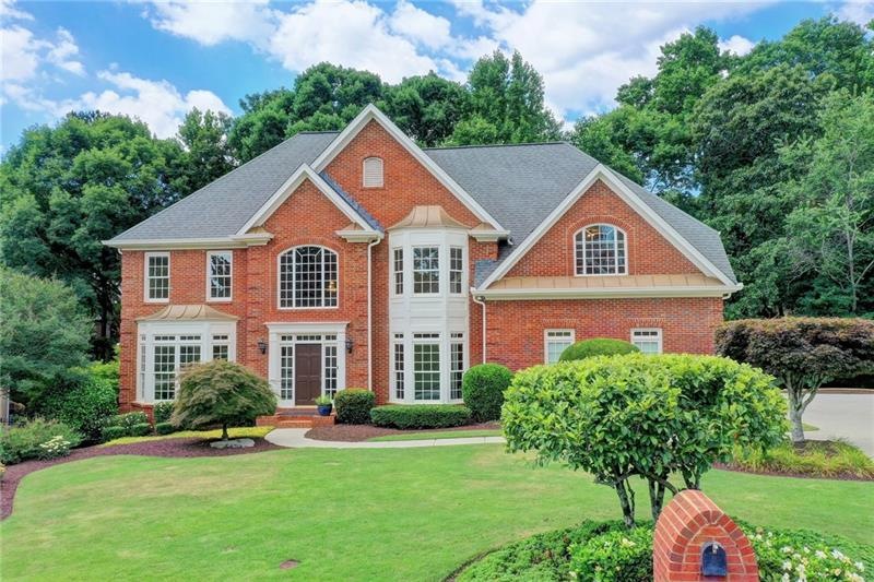 This beautiful brick home on a quiet side street i