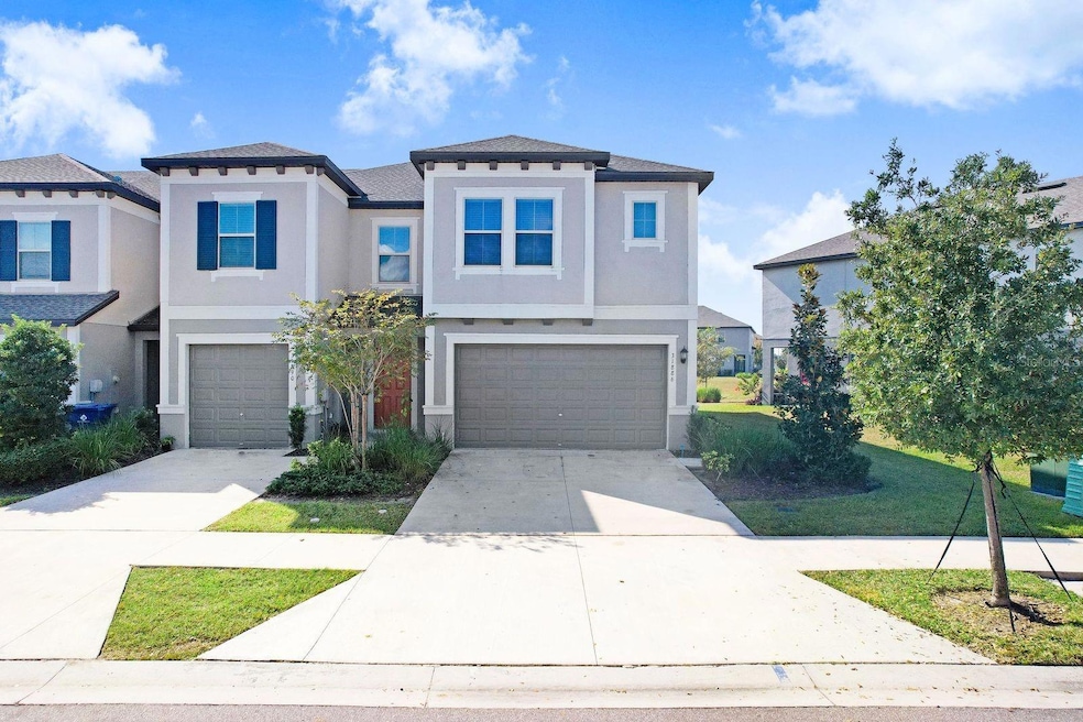 31886 Blue Passing Loop, Wesley Chapel, FL 33545 - photo 1