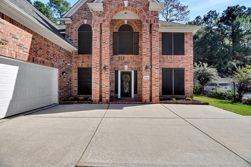 11198 Ridgemoor Estates Ln, Conroe, TX 77385 - photo 1