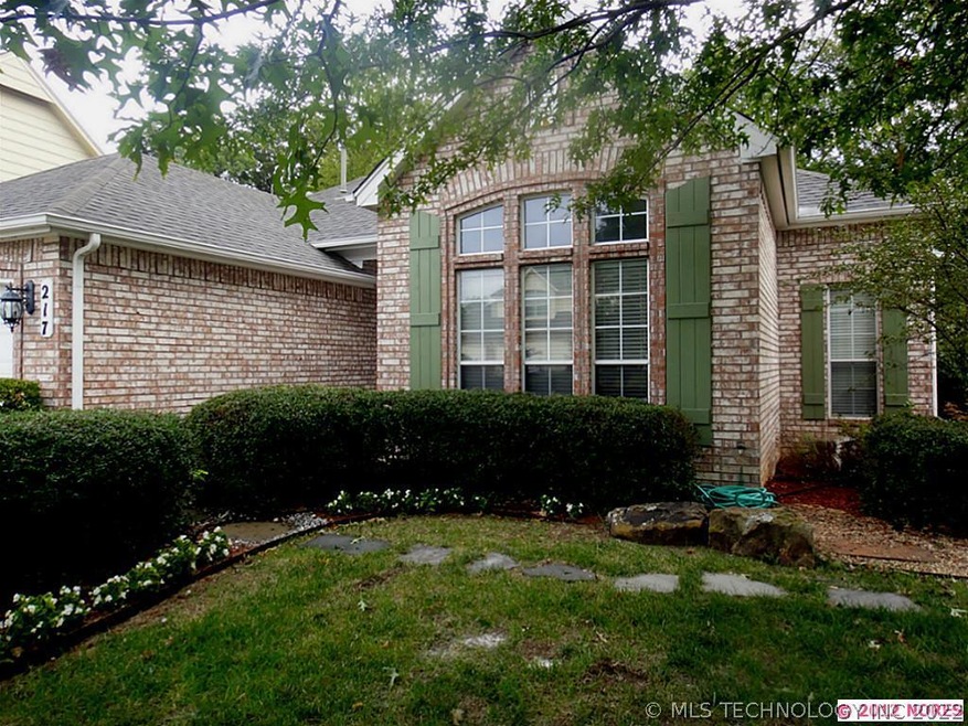 Full brick with professional landscape