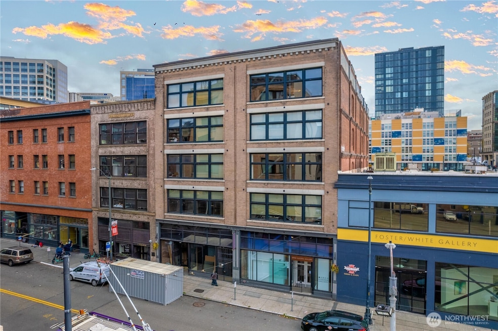 Iconic downtown building built in 1907 retrofitted with modern amenities. Live/work zoning.