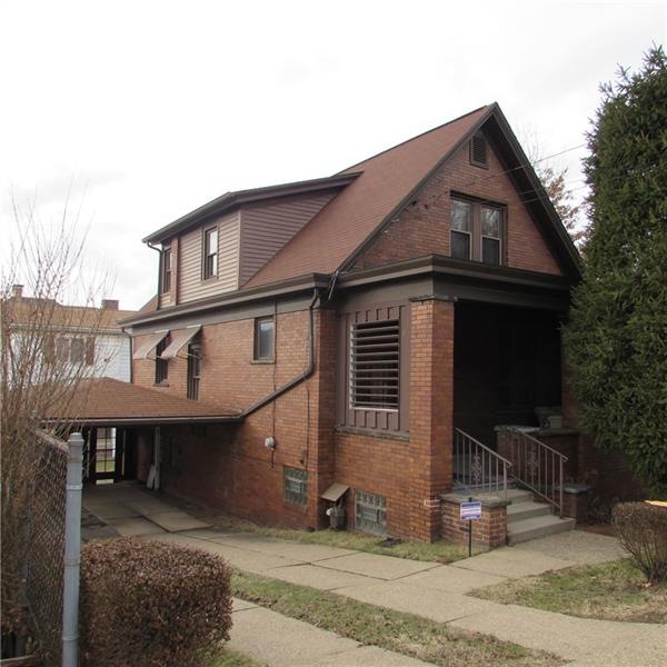Brick exterior Covered Carport