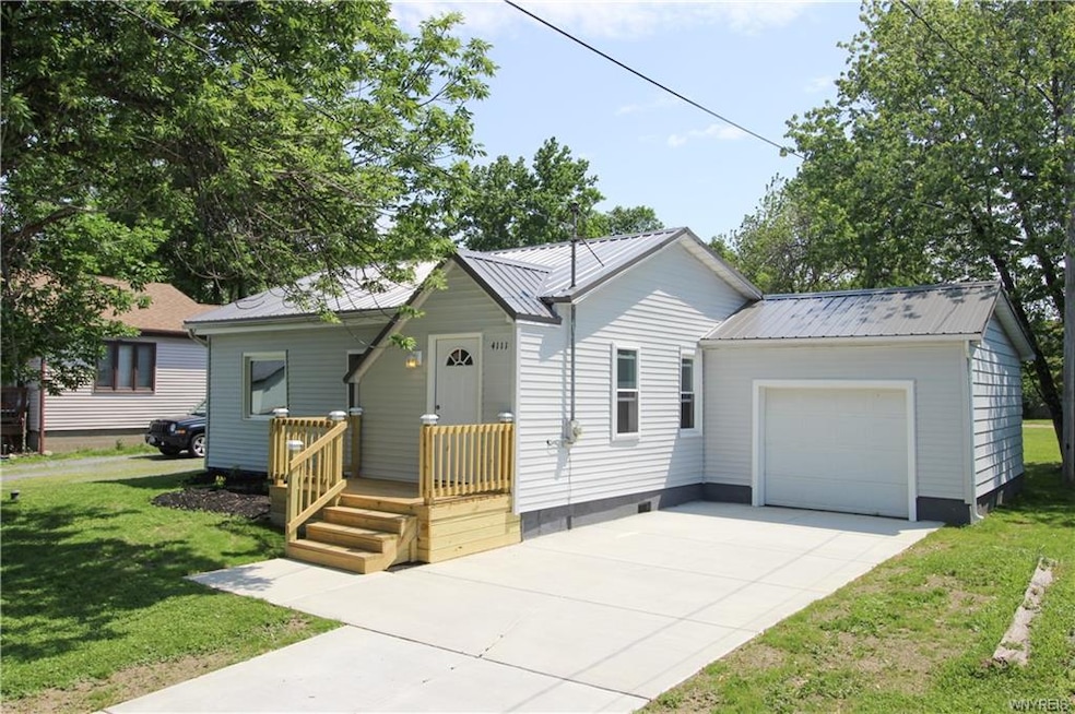 Brand new roof, siding, driveway, front deck, and 