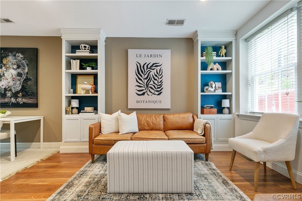 Sitting room featuring hardwood / wood-style floor