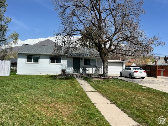 Ranch-style home featuring concrete driveway and covered porch